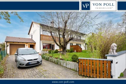 Titelbild - Haus kaufen in Odelzhausen - Gemütliches Haus mit Einbauküche, Gäste-WC, Terrasse, Garten und Garage