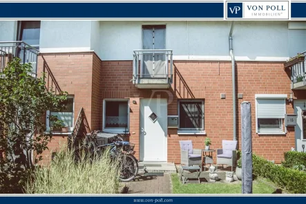 Titelbild - Haus kaufen in Bardowick - Klassisches vermietetes Mittelreihenhaus mit pflegeleichtem Garten als solide Kapitalanlage