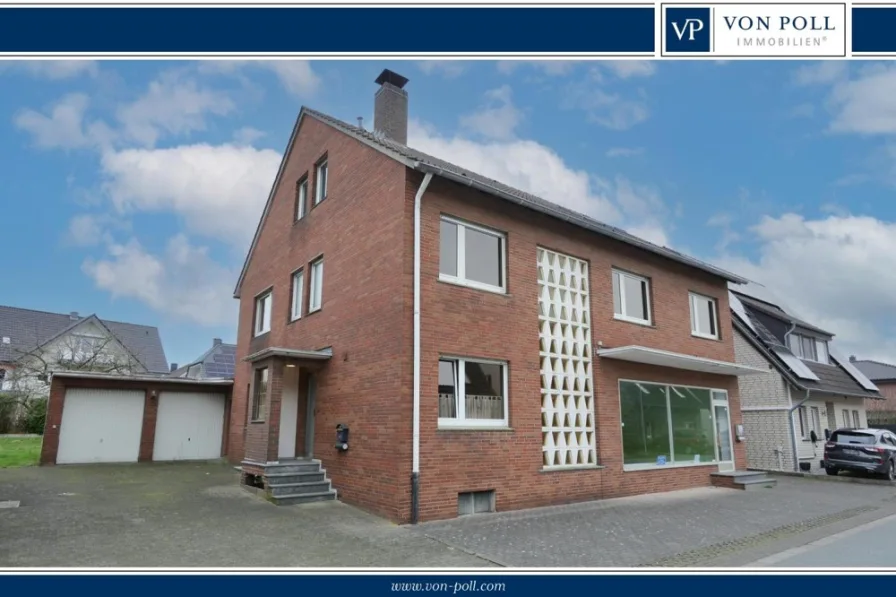 Titelbild - Haus kaufen in Paderborn / Wewer - Großzügiges Einfamilienhaus mitLadenlokal und schönem Garten