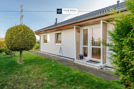 Titelbild - Haus kaufen in Bentwisch / Neu Bartelsdorf - Neue Heizungsanlage: Charmanter Bungalow im Grünen