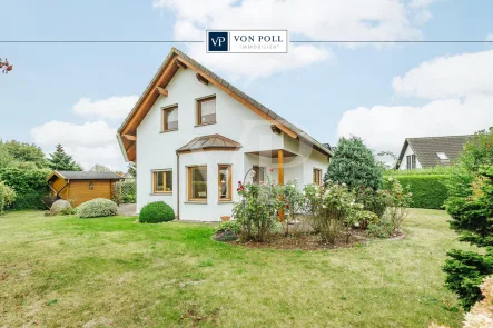 Titel - Haus kaufen in Elmenhorst-Lichtenhagen - Charmantes Einfamilienhaus in Randlage mit Blick ins Grüne