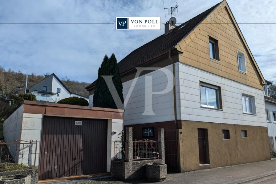  - Haus kaufen in Saarbrücken / Jägersfreude - Doppelhaushälfte mit Garten und Garage