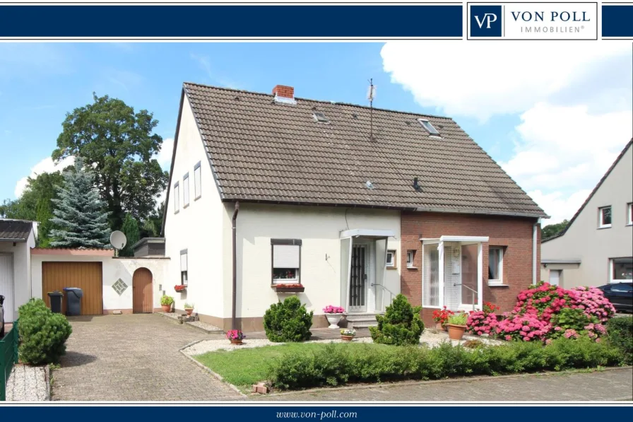 Titelbild - Haus kaufen in Bergkamen - ***Bieterverfahren***Familiäres Wohnhaus mit großem Garten und Garage