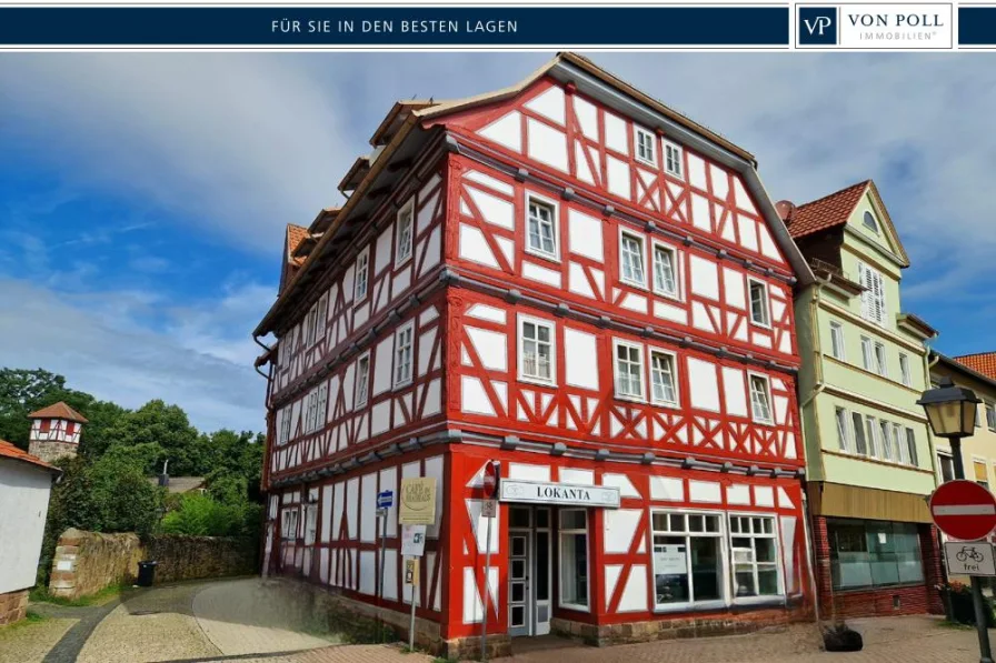 Titelbild - Haus kaufen in Hessisch Lichtenau - Gepflegtes Renditeobjekt mit 5 Wohnungen und Gewerbeeinheit in Hessisch Lichtenau
