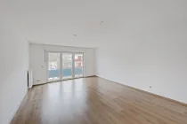 Wohnzimmer mit Balkon