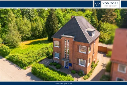 Titelbild - Haus kaufen in Kiel - Charmantes Mehrfamilienhaus in Kiel: Zeitloser Backsteinbau mit Modernem Wohnkomfort