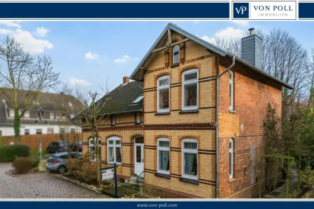 Titelbild - Haus kaufen in Hohenwestedt - Charmantes, vielfältig nutzbares Zweifamilienhaus in zentraler Lage