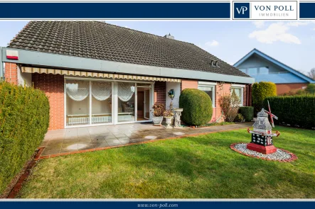 Titelfoto - Haus kaufen in Kiel / Suchsdorf - Sehr gepflegtes, freistehendes Einfamilienhaus mit Sonnengrundstück in top Lage