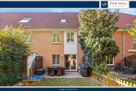 Titel-Hausansicht_aus_Gartenperspektive - Haus kaufen in Schönefeld - Geräumiges, modernes Reihenhaus mit pflegeleichtem Garten in gefragter Lage