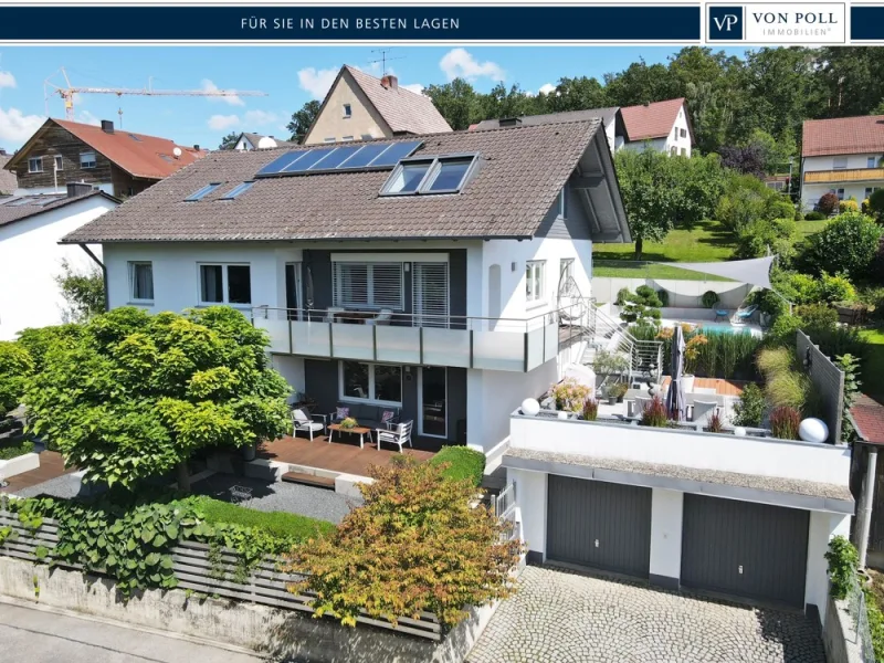 Vorderansicht - Haus kaufen in Essenbach / Mirskofen - Luxuriöse Wohnvielfalt: Einzigartiges Zweifamilienhaus mit Pool in Mirskofen/Essenbach