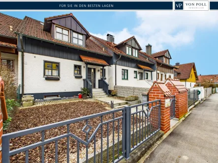 Vorderansicht - Haus kaufen in Altdorf - Charmantes Reihenmittelhaus mit Wintergarten, Einliegerwohnung und unverbaubarem Blick in Altdorf