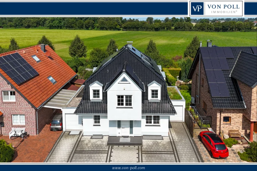 Titelbild - Haus kaufen in Dormagen - Schöner Wohnen in Zons! Luxuriöses Einfamilienhaus mit Wärmepumpe und PV-Anlage