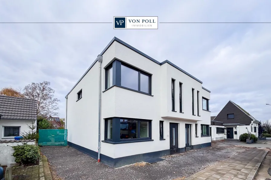 Titelbild  - Haus mieten in Neuss - Energieeffiziente Neubau-Doppelhaushälfte mit moderner Ausstattung