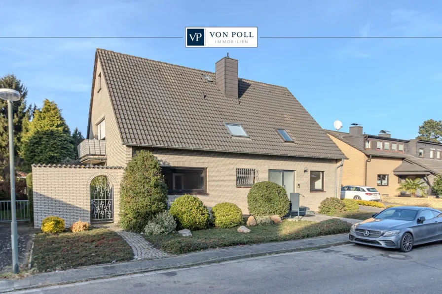 Titelbild - Haus kaufen in Neuss - Zeitlos-modernes Zweifamilienhaus in Allerheiligen