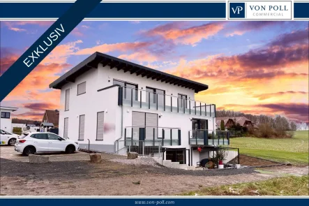 Titelbild mit VP Logo - Wohnung kaufen in Freudenberg-Oberholzklau - Erstbezug eines exklusiven Penthouse mit  Sonnenterrasse im KfW55 Standard