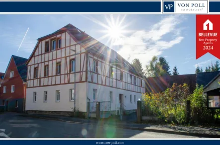 Titelbild - Haus kaufen in Suhl - "Attraktives Mehrparteienhaus – Solide Kapitalanlage in ruhiger Lage"