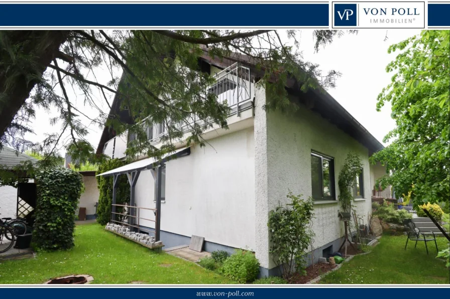  - Haus kaufen in Heroldsbach - Geräumiges Familienhaus in grüner Umgebung mit Garten und Garage