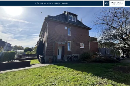 Frontansicht - Haus kaufen in Münster - Charmantes Mehrfamilienhaus – Erweiterungs- und Neubaupotenzial inklusive