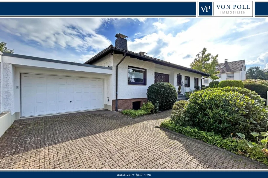 Hausansicht - Haus kaufen in Bonn / Niederholtorf - Charmanter Bungalow mit großzügigem Raumangebot und sonnigem Grundstück für die Familie