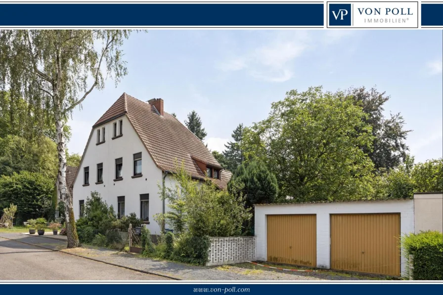 Hausansicht - Haus kaufen in Siegburg - Ideal für die junge Familie! Stadtnahes Wohnen mit großem Garten