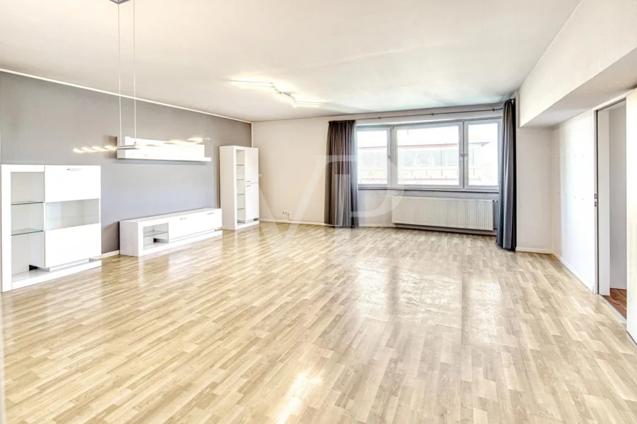 Blick in das Wohnzimmer - Wohnung kaufen in Düren - Wertbeständige Etagenwohnung in zentraler Lage von Düren