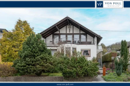 Titelbild - Haus kaufen in Westerburg - Charmantes Einfamilienhaus in ruhiger Wohnlage