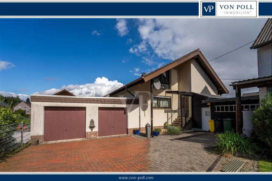 Hausansicht - Haus kaufen in Montabaur - Charmanter Bungalow mit Doppelgarage in ruhiger Wohnlage