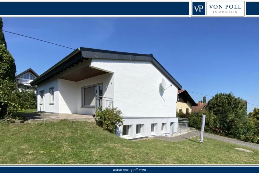 Gartenansicht - Haus kaufen in Montabaur / Elgendorf - Modernes Wohnen auf einer Ebene- Sanierter Bungalow mit Stil!