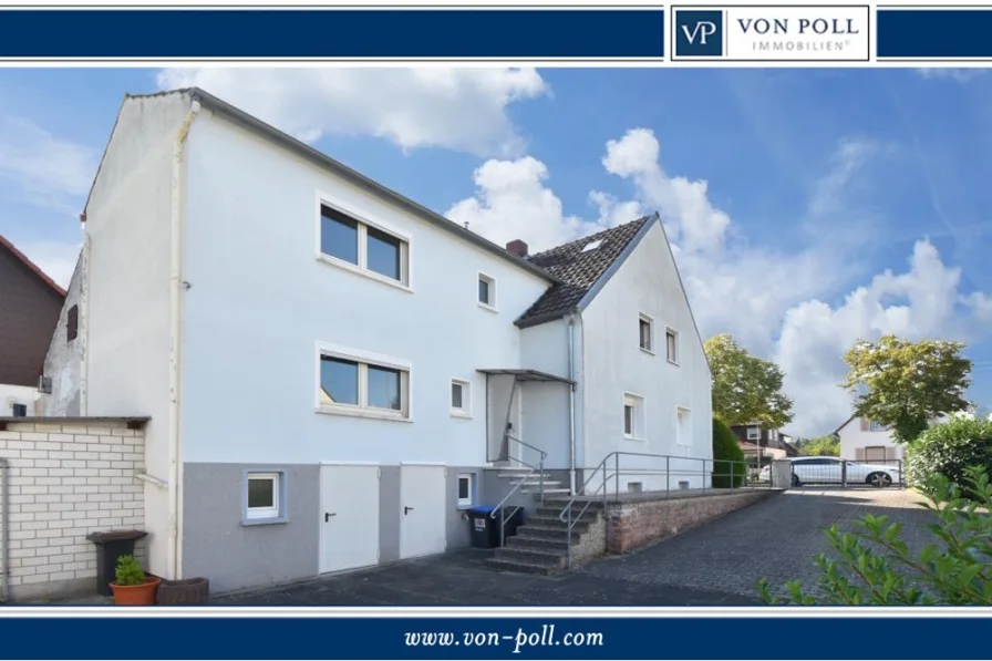 Titelbild - Haus kaufen in Neuhofen - Ein- bis Zweifamilienhaus mit breitem Hof und kleinem Garten