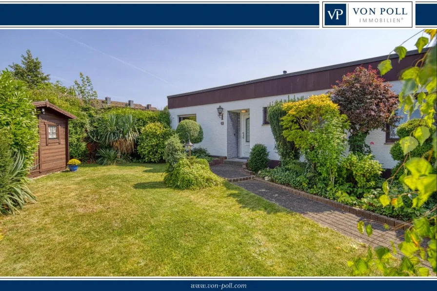 Titelbild - Haus kaufen in Pulheim - Freistehender Bungalow mit Garage und Sonnengarten in Pulheim