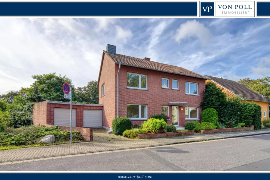 Titelbild - Haus kaufen in Pulheim - Freistehendes Einfamilienhaus im Herzen von Pulheim