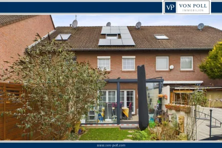 Titelbild - Haus kaufen in Bergheim - Charmantes Reihenmittelhaus mit hochwertiger Sanierung und moderner Ausstattung