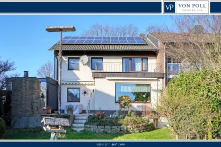 Ansicht Gartenseite - Haus kaufen in Bochum - Attraktives Reihenendhaus mit Photovoltaik und Erdwärmeheizung in ruhiger, grüner Wohnlage