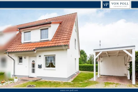 Hausansicht - Haus kaufen in Ahrensfelde - Familienfreundliches Reihenendhaus mit Blick ins Grüne & Whirlpool in begehrter Lage von Ahrensfelde