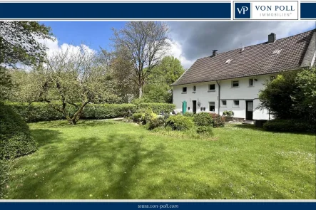 Titel_Haus_Rückansicht - Haus kaufen in Haan - Charmantes Fachwerkhaus auf malerischem Grundstück - ein Juwel im historischen Gruiten Dorf!