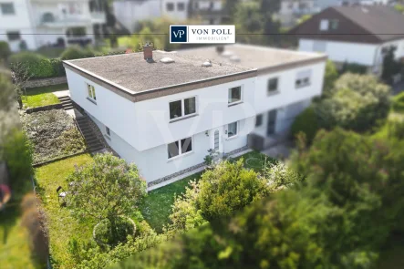 Titelbild - Haus kaufen in Weil der Stadt - Gepflegte Doppelhaushälfte mit sonniger Terrasse