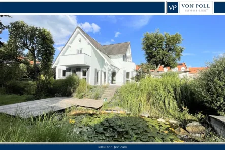 Titelbild - Haus mieten in Usingen - Charmantes Architektenhaus im Kern von Usingen mit schönem Garten, Doppelgarage und Einliegerbereich