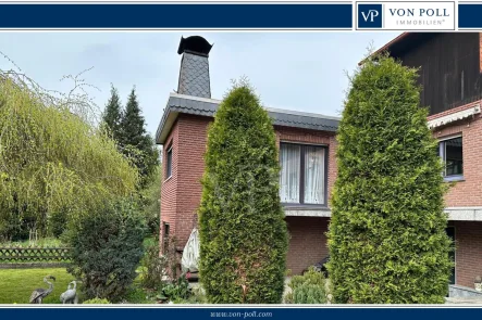 Garten mit kleinem Teich - Haus kaufen in Weilmünster - Verwirklichen Sie Ihren persönlichen Wohntraum - solides Zweifamilienhaus in Weilmünster-Lützendorf