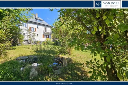 Garten mit Teich - Haus kaufen in Schmitten / Niederreifenberg - Charmantes Familienhaus auf sonnigem Grundstück mit großem Garten, Balkon, Terrasse und Doppelgarage