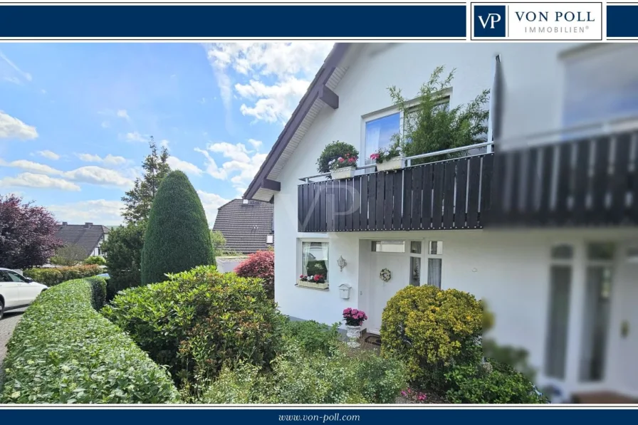 Vorgarten Eingangsbereich - Haus kaufen in Usingen - Solide vermietete Doppelhaushälfte mit tollem Fernblick, uneinsehbarem Garten, Garage und Stellplatz