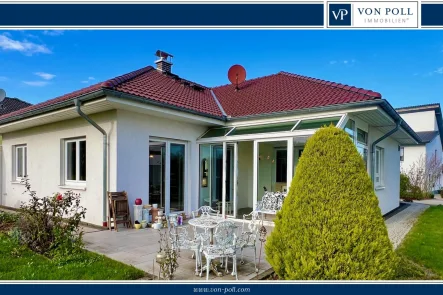 Titelbild - Haus kaufen in Pohlheim / Holzheim - Einzel Stück - barrierefreier Bungalow in schöner Lage