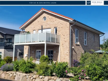 Vorderseite - Haus kaufen in Kappeln - Großzügiges, freistehendes Einfamilienhaus mit zwei Vollgeschossen im mediterranen Stil.