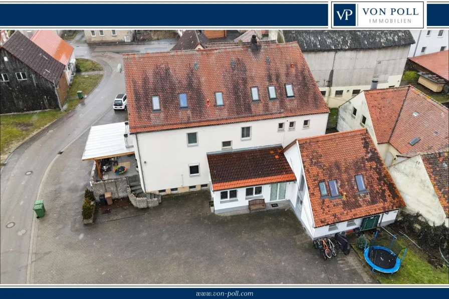 Titelbild - Haus kaufen in Lehrberg - Attraktives Mehrfamilienhaus mit sechs Wohneinheiten – modernes Wohnen mit hochwertiger Ausstattung