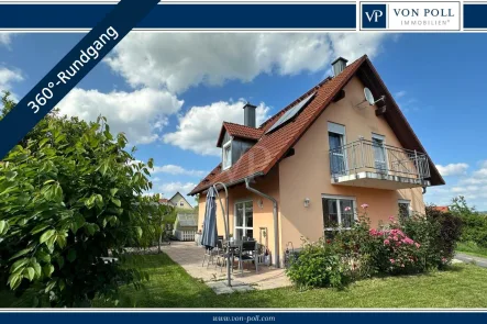 Titelbild - Haus kaufen in Haßfurt / Sylbach - Gemütliches kleines EFH mit Garten und Garage