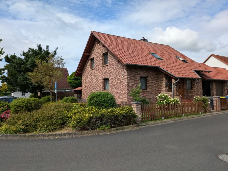 Titelftoto - Haus kaufen in Gudensberg / Maden - Geräumiges Familienhaus mit Garten und Doppelgarage