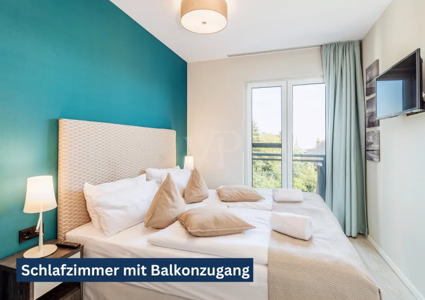 Schlafzimmer mit Balkonzugang