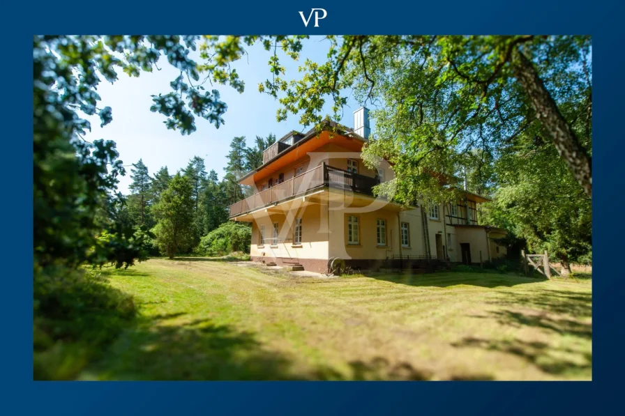 Titelbild - Haus kaufen in Südheide - Charmante Jugendstil-Jagdvilla auf Waldlichtung mit moderner Ausstattung