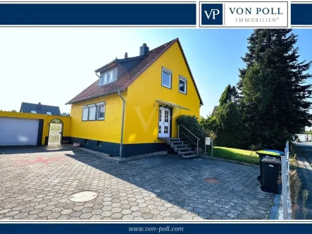 Titelbild - Haus kaufen in Celle / Wietzenbruch - **Einfamilienhaus mit tollem Garten in ruhiger Lage!**