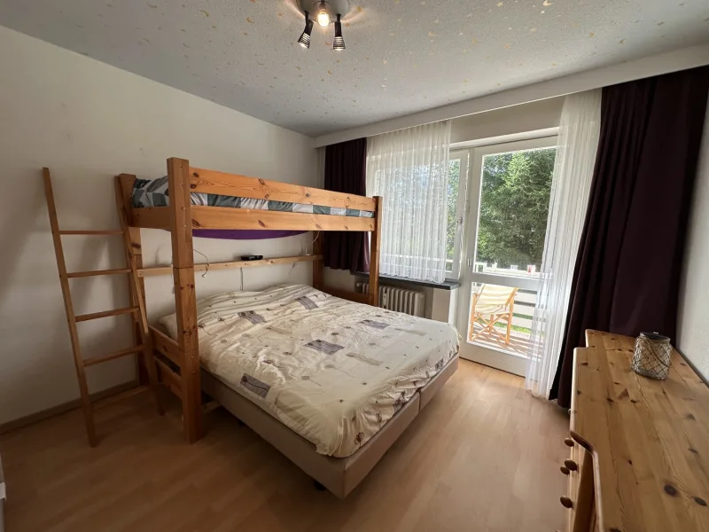 Schlafzimmer mit zusätzlichem Hochbett