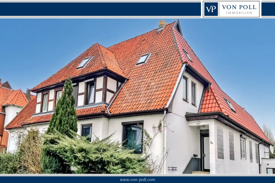 Titelbild - Haus kaufen in Uelzen - Geräumige Doppelhaushälfte mit separater Wohnung und zahlreichen Extras in Uelzen